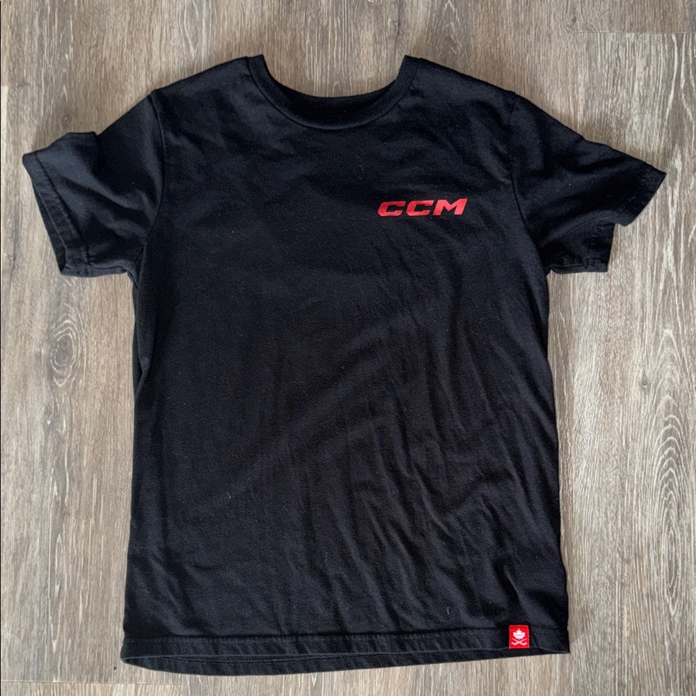 CCM Youth Black Tee with Red Logo